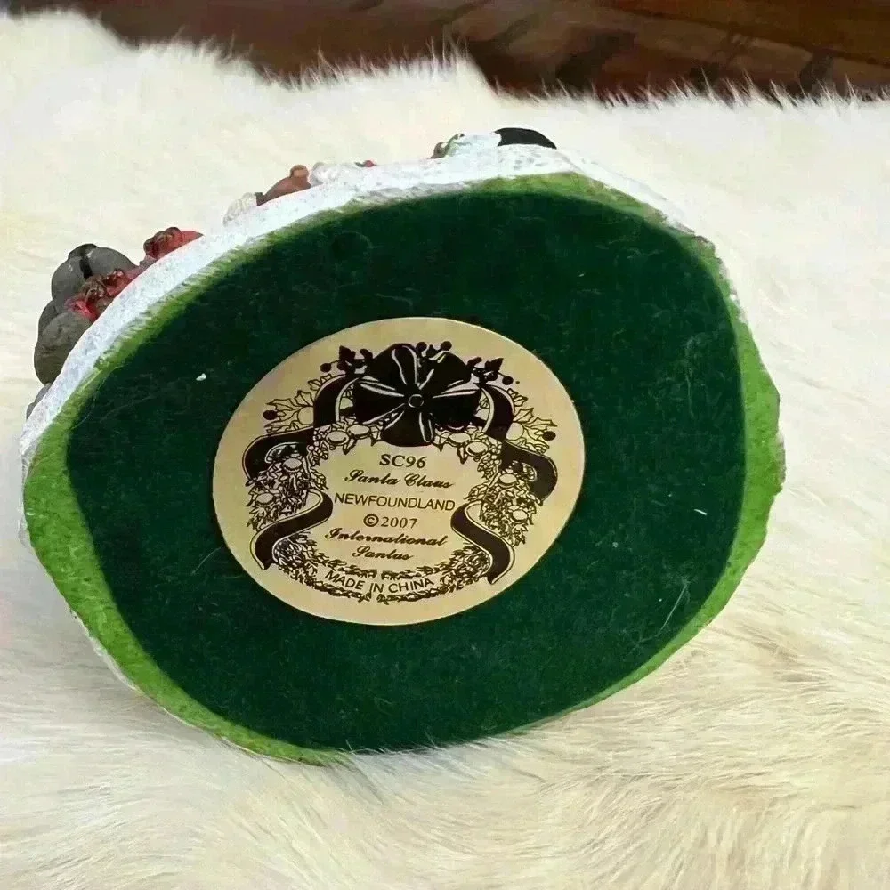 The International Santa Claus Collection Newfoundland Figurine